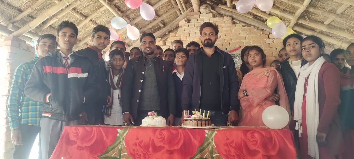 Volunteers and children together